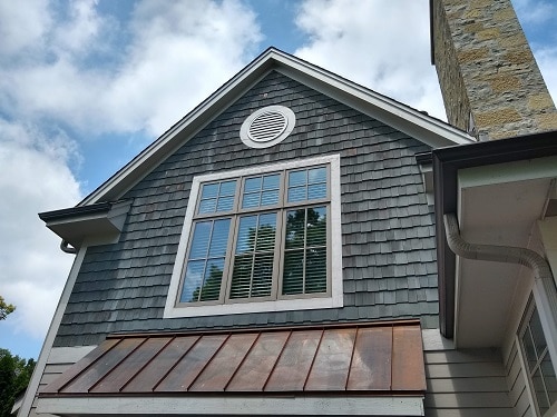 cedar siding shake home that needs the exterior refinished