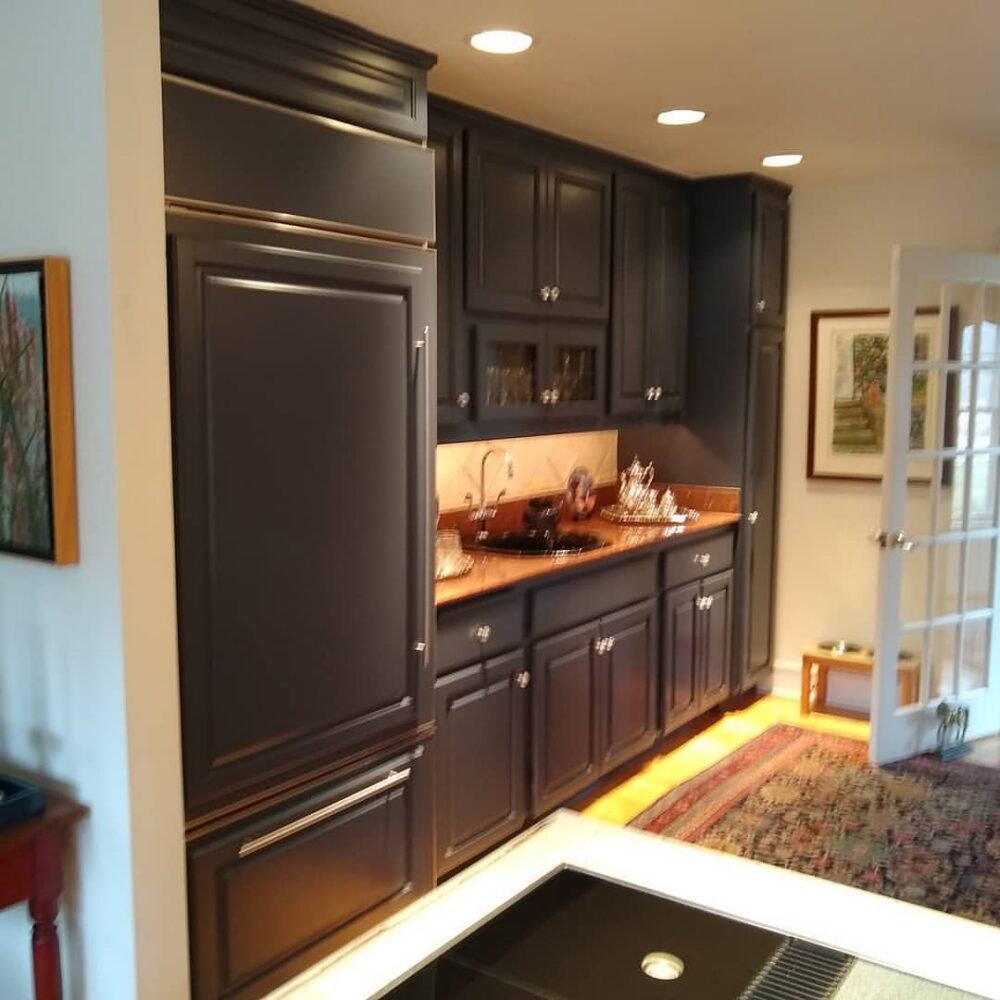 After photo of a painted kitchen cabinet project by Empire Painting