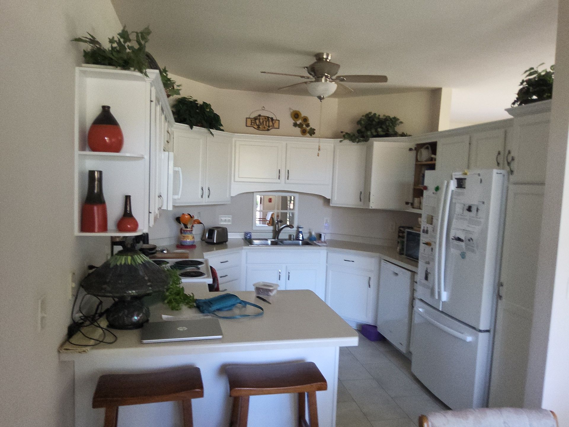 White kitchen cabinets in a Brookfield home