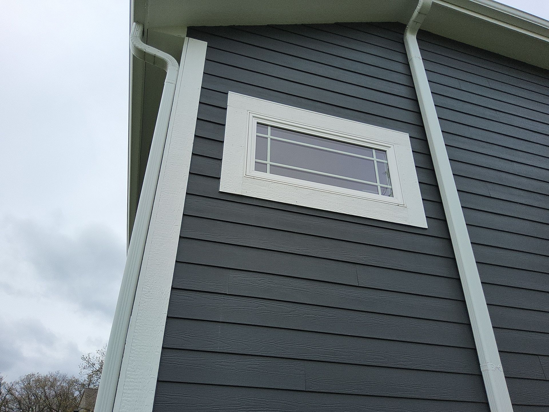 Horizontal window and white corner trim in Wales, Wisconsin