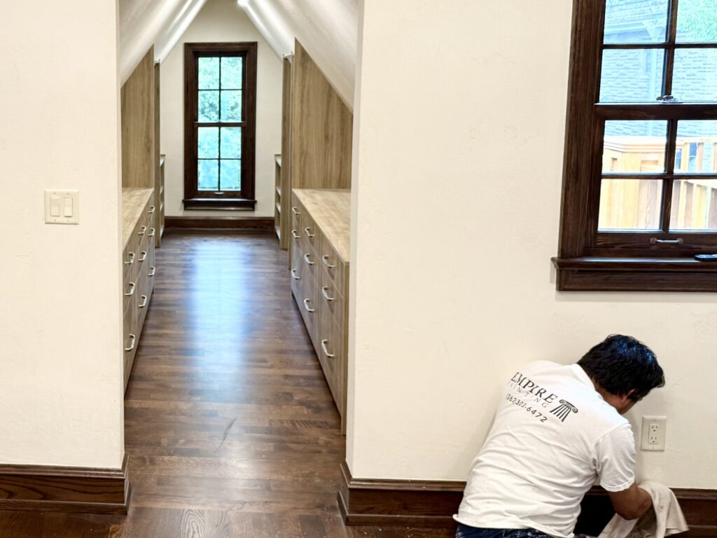 Edgar of Empire Painting working on interior trim in a Whitefish Bay home