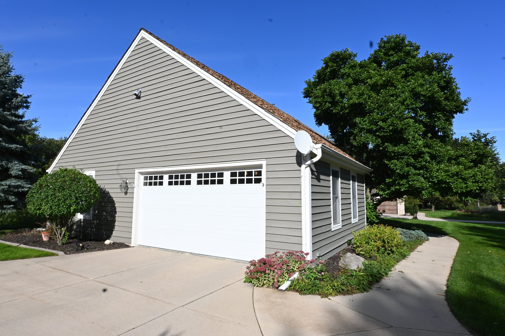 Brookfield garage with painted gray siding and white trim