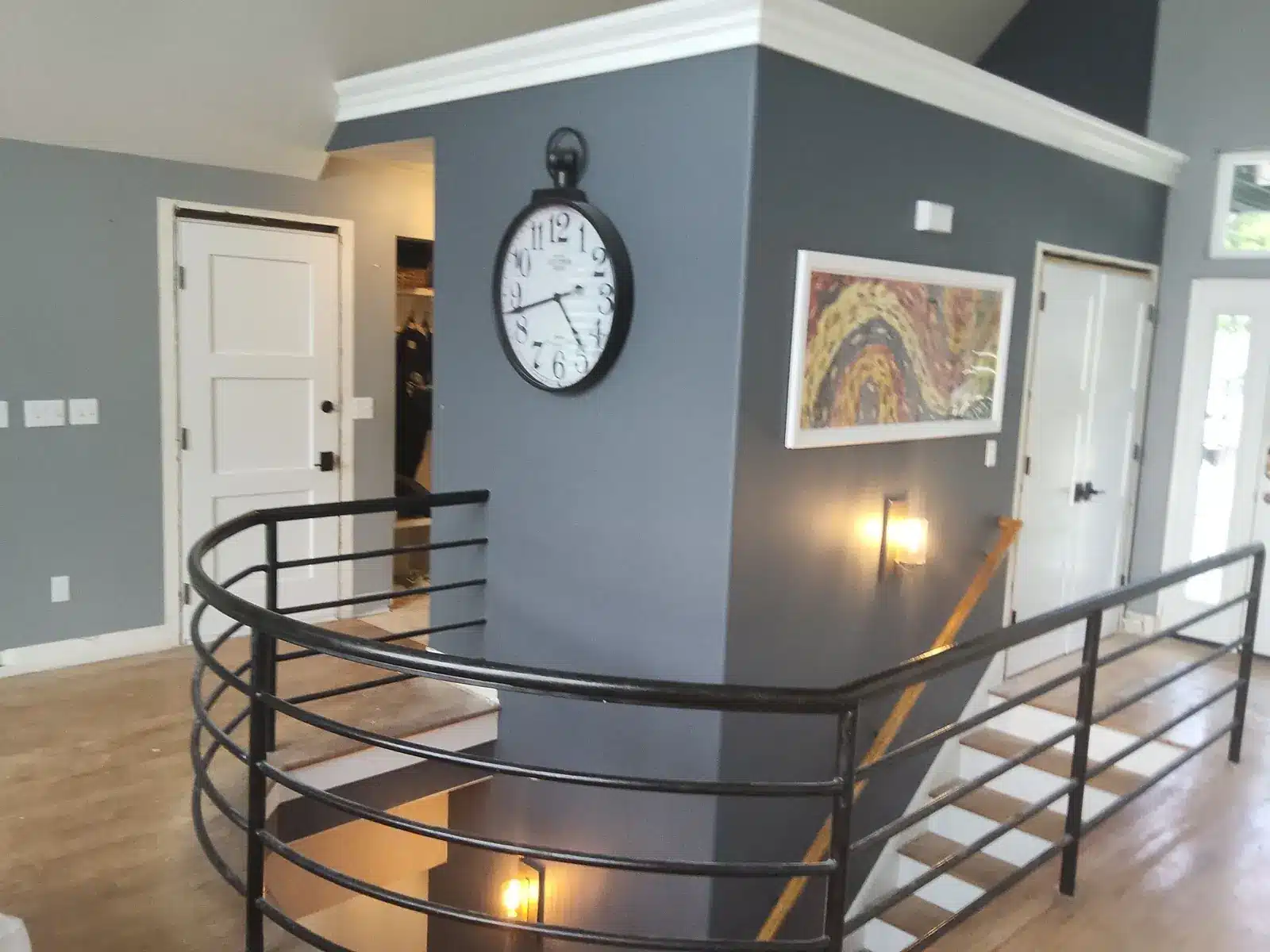 Gray interior stairwell walls with white trim in Mukwonago