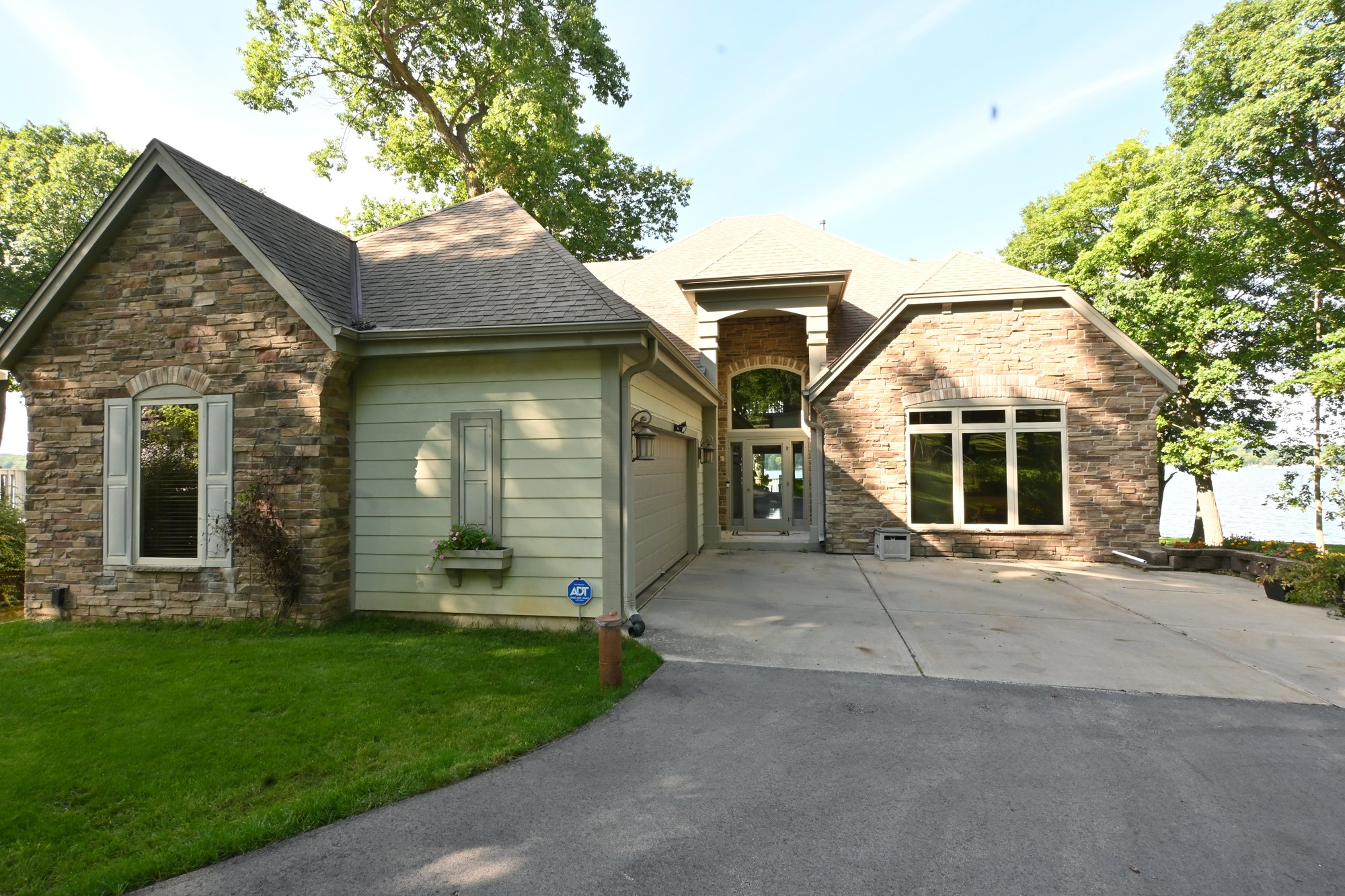 Front approach to the Pewaukee home after exterior painting