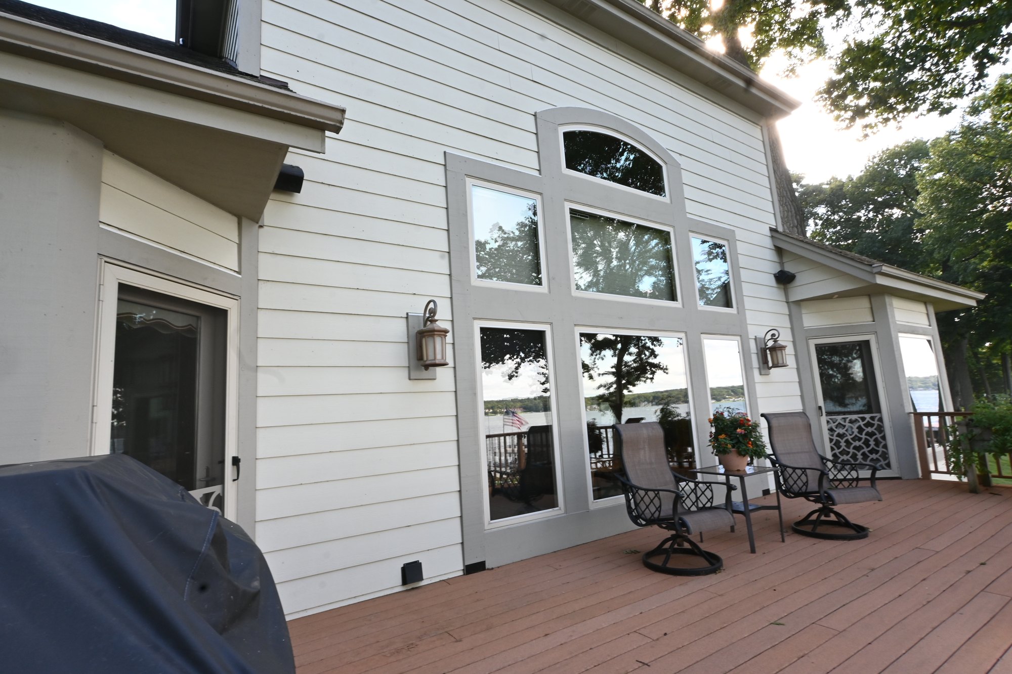 Painted siding and window trim details on the Pewaukee lake home