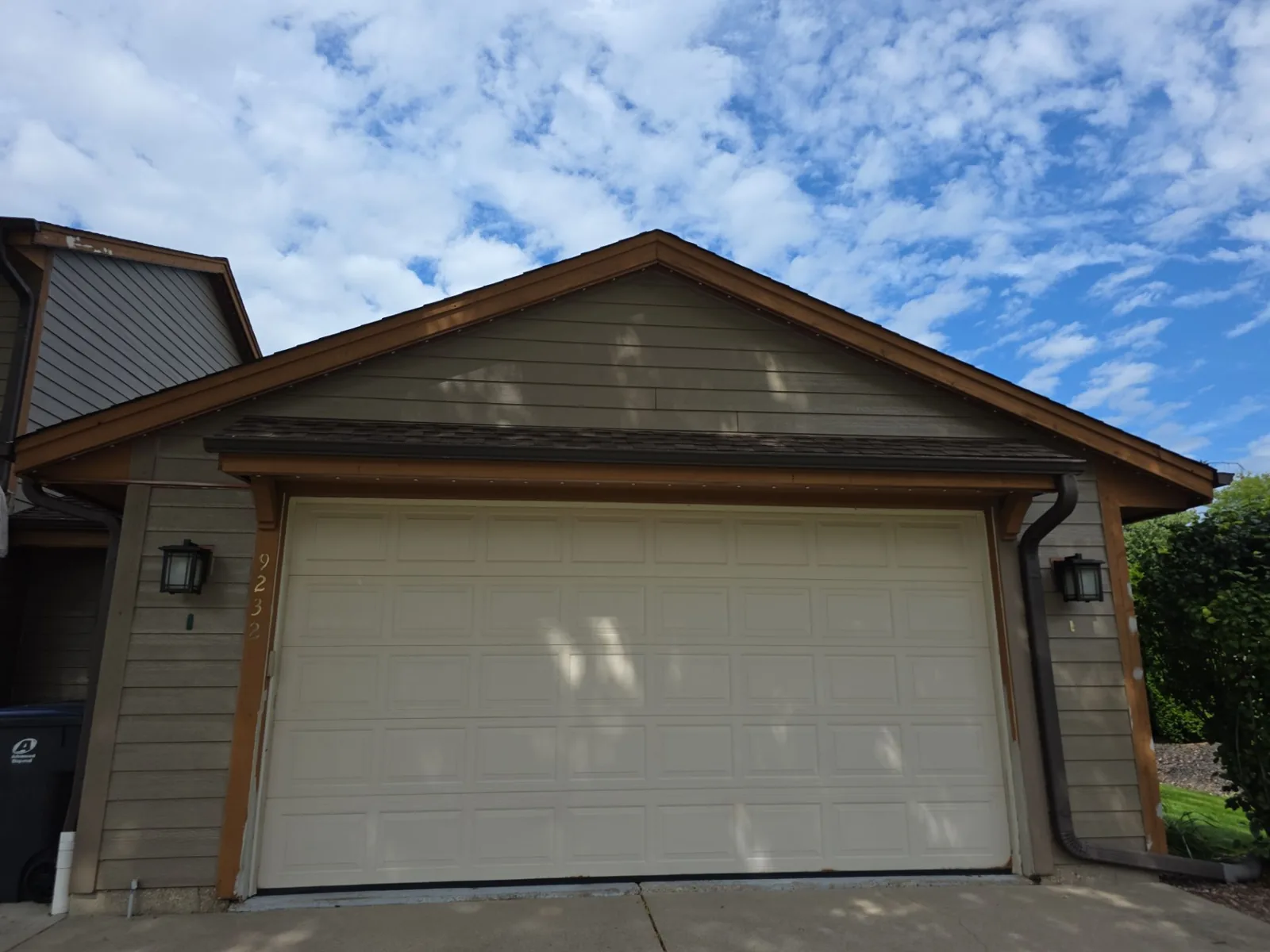 Before: garage gable and cedar trim before refinishing