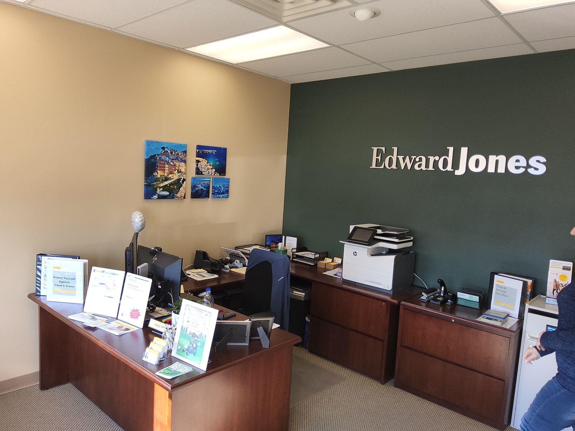 West Bend office interior with tan walls and a green accent wall