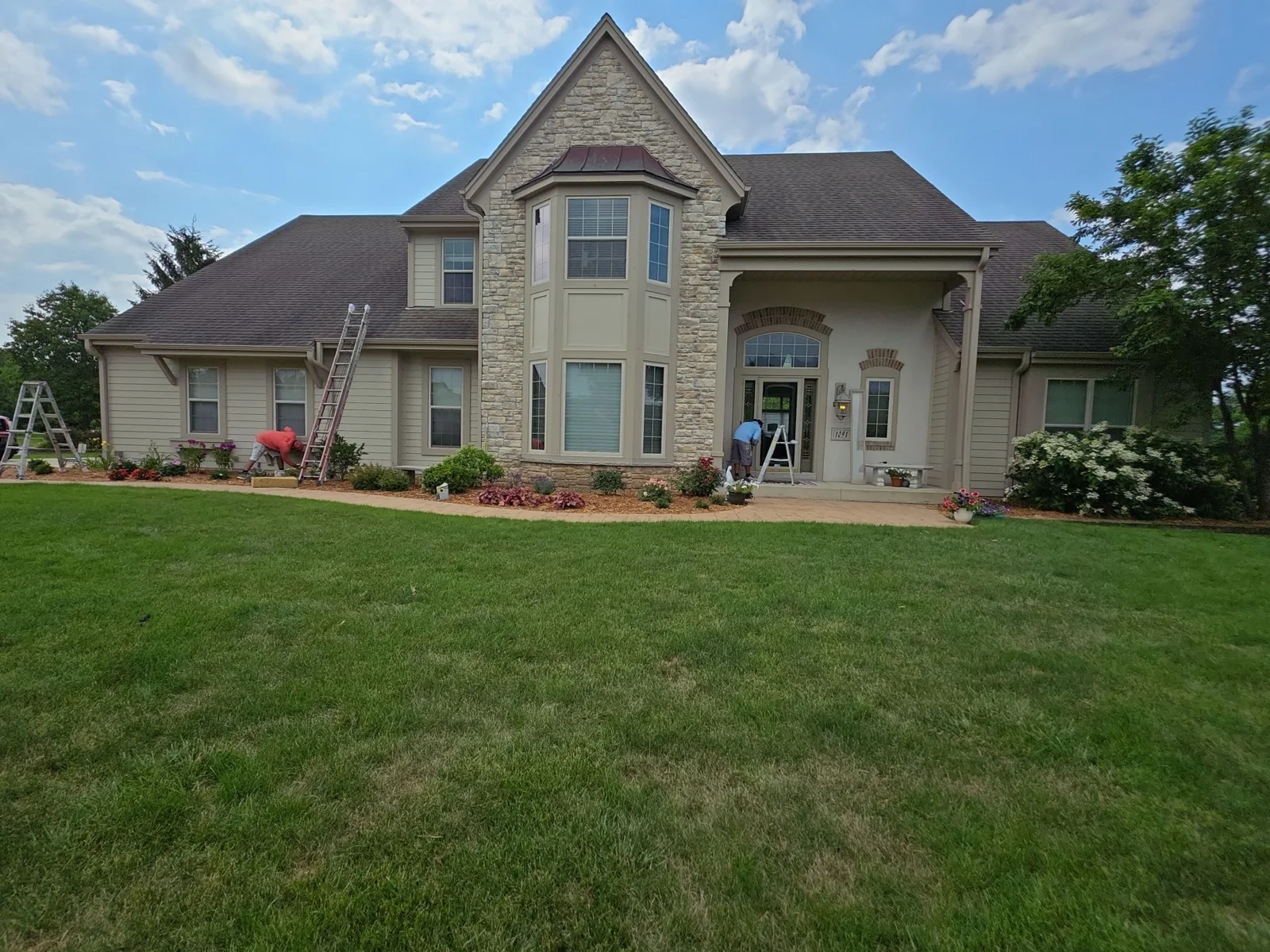 Before-and-after comparison of a detailed Pewaukee exterior painting project