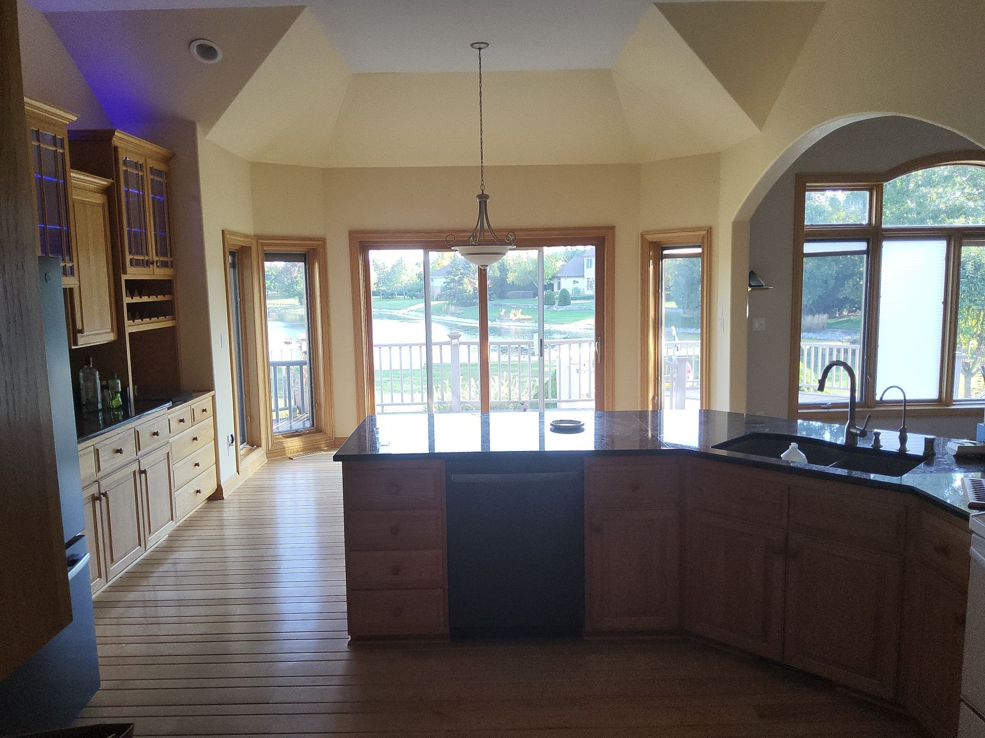 Franklin kitchen and dining area with warm wood trim