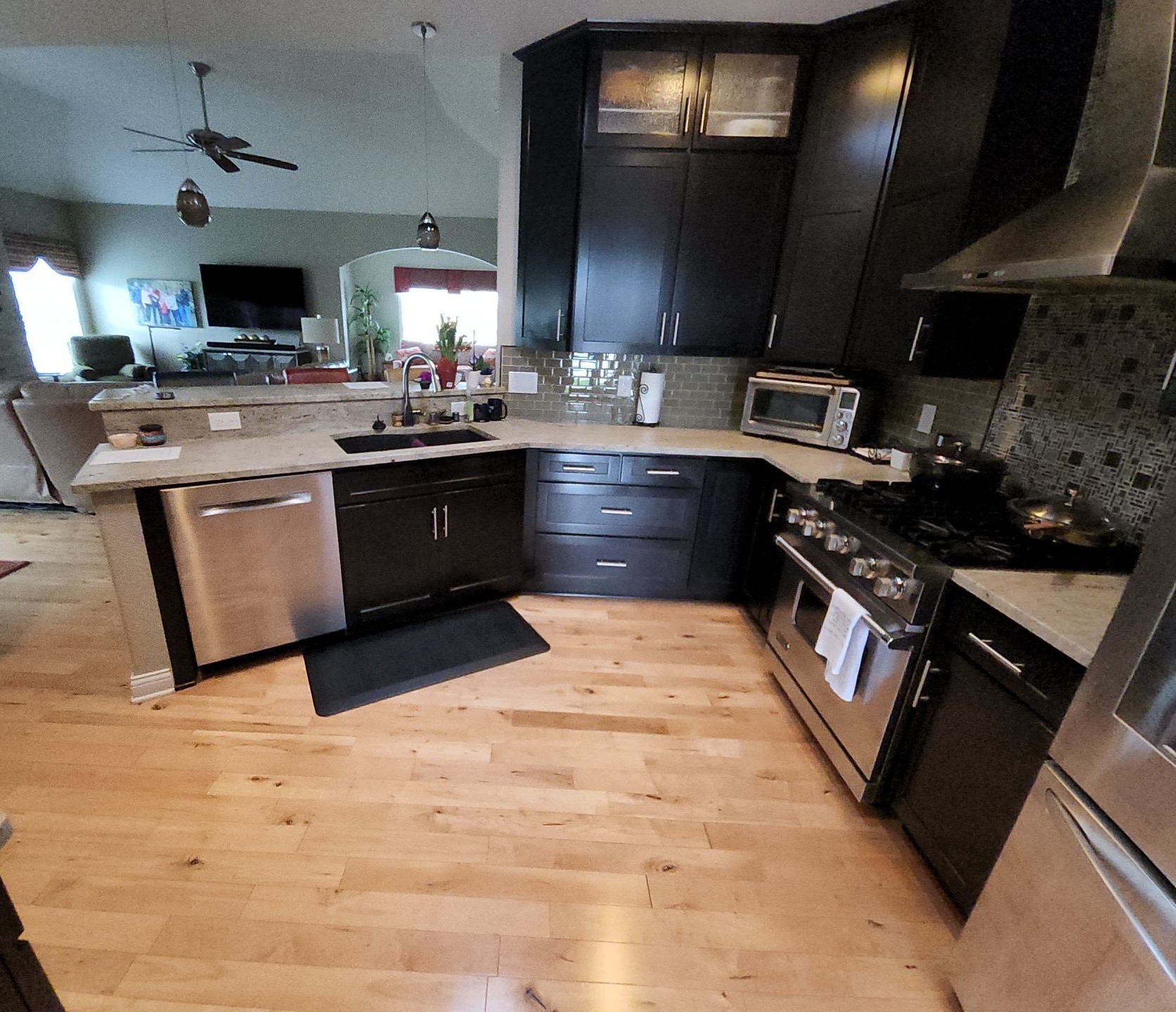 New Berlin kitchen with dark cabinets and light countertops