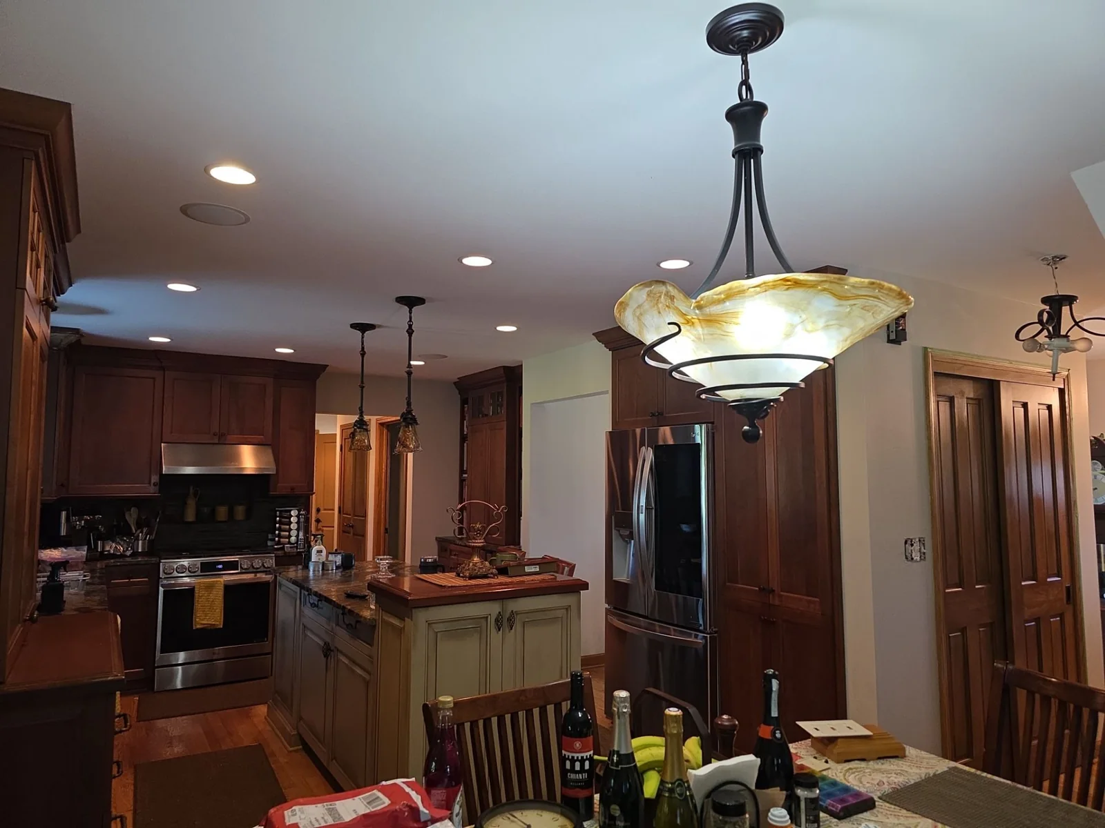 During the interior project: kitchen and dining-area walls alongside the existing wood cabinetry.